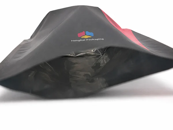 Stand up pouch bottom gusset detail showing flexible packaging structure with Honghai Packaging logo