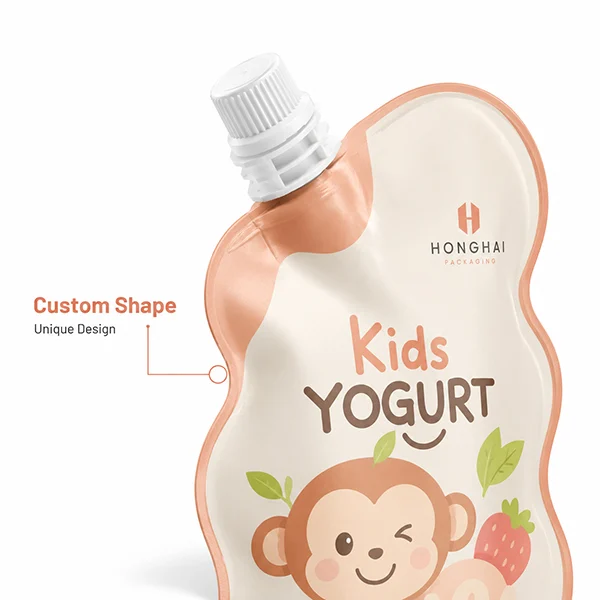 Close-up of a custom shaped spout pouch with unique outline design for kids yogurt packaging